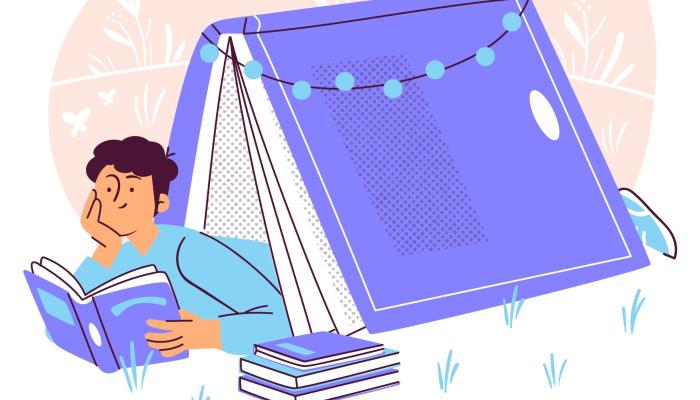 Un homme lisant allongé sous un livre